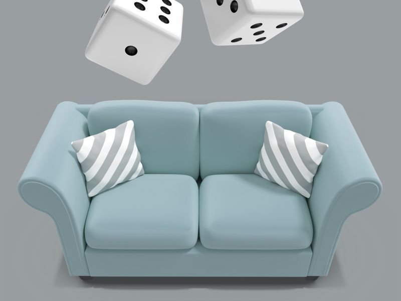 Image 3D de deux dés tombant sur un canapé - Le design 3D continue de gagner en popularité - Image