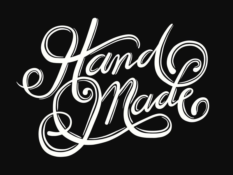 Hand drawn word "handmade". White text on black background - Hand-drawn typography remains popular in 2019 - Image