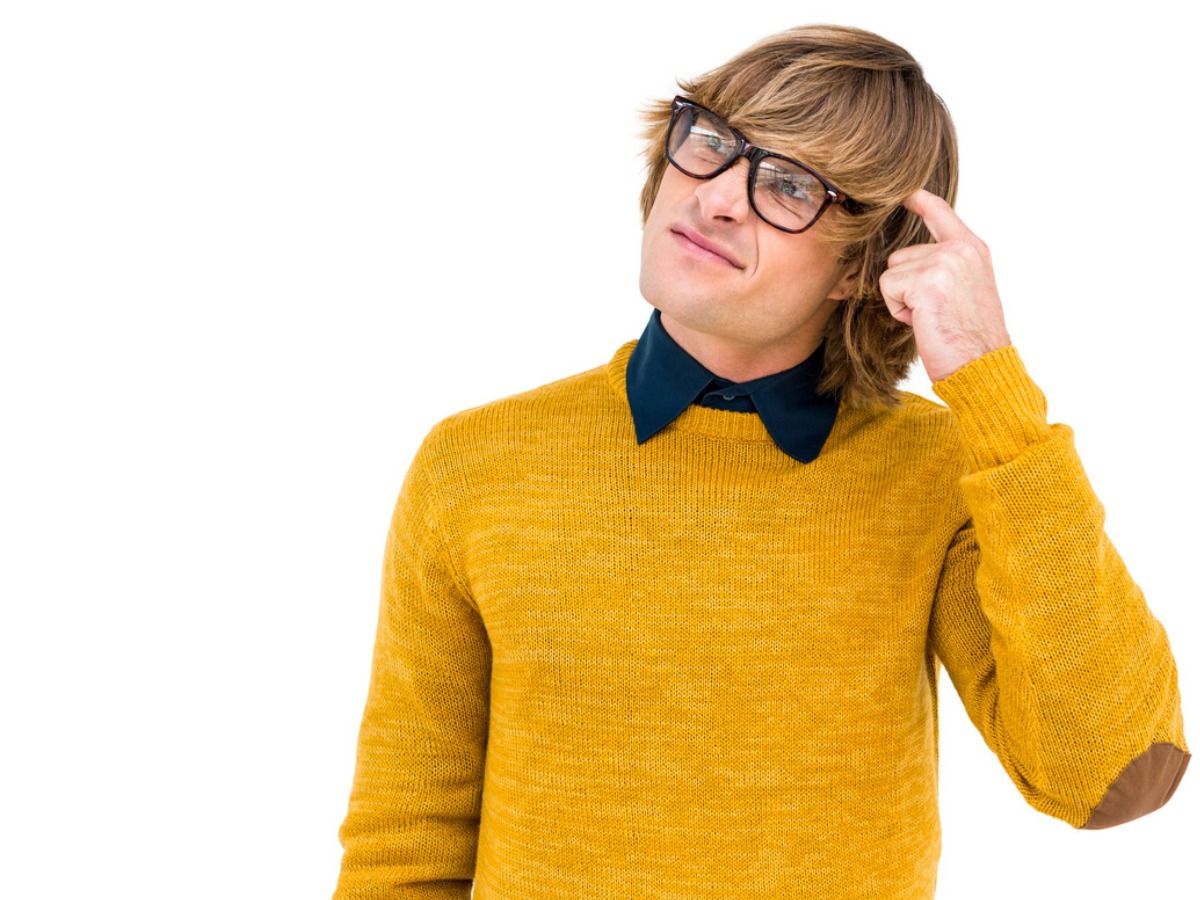A guy in glasses, a blue shirt, and a yellow sweater scratching his head - Tips on how to write the problem/solution blog posts - Image