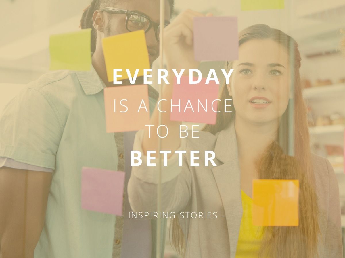 Image of co-workers looking at notes with 'everyday is a chance to be better' written in white - How customers can create content for your brand - Image