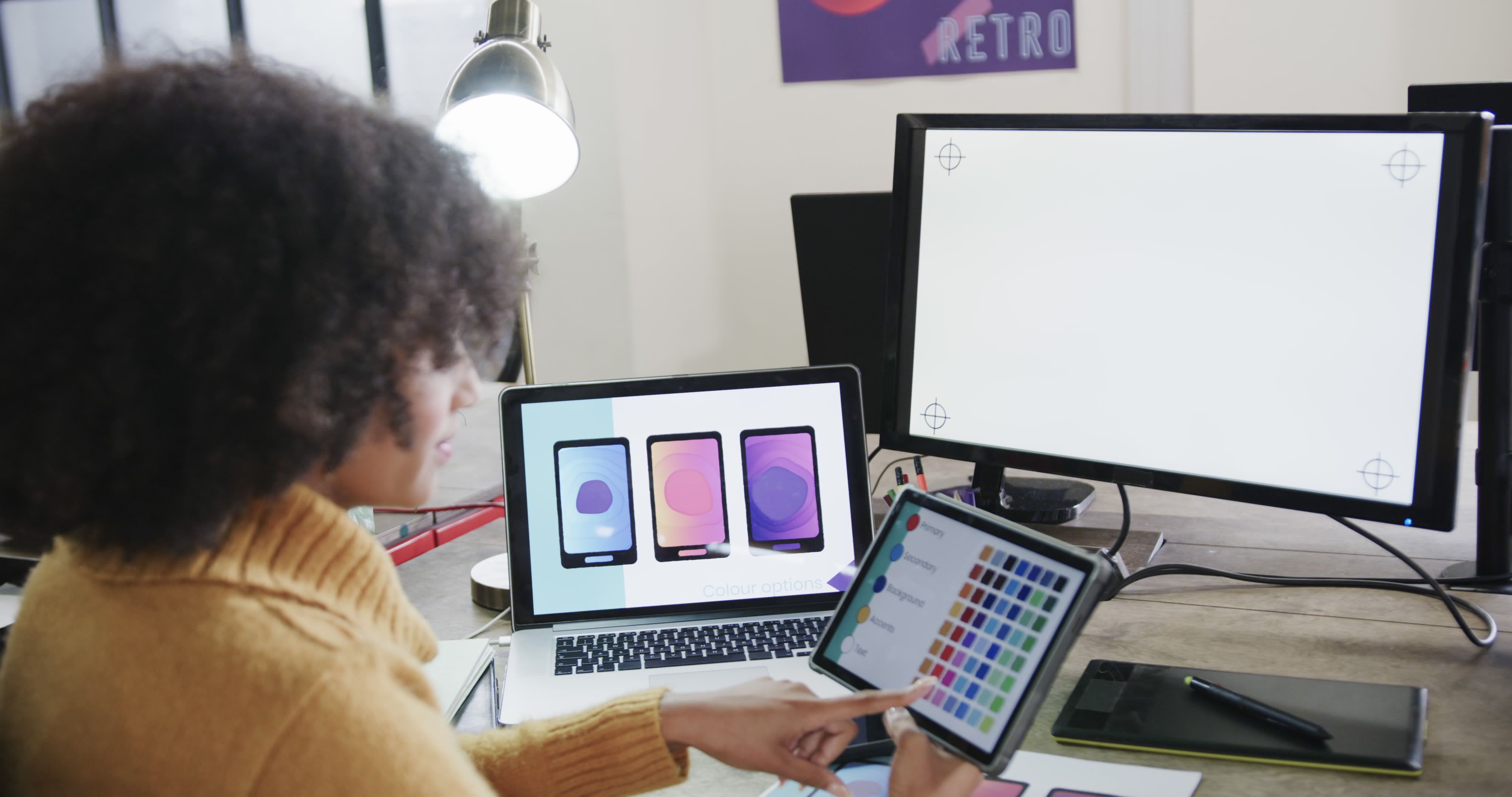 Designer Working on Color Palette for Mobile App Development - Image