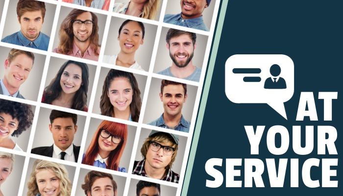 Fotos na cabeça de várias pessoas felizes e &quot;at your service&quot; como título