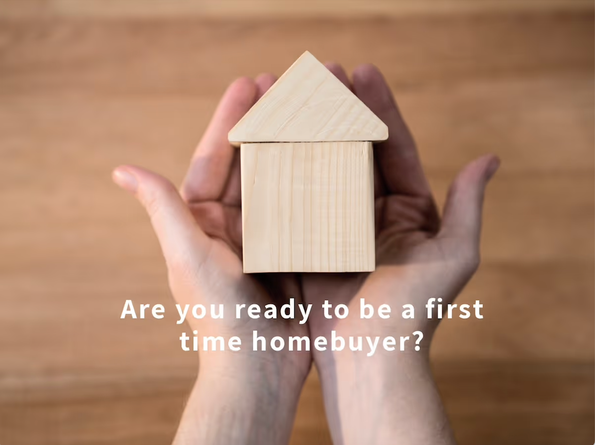 Person holding miniature house in hands and 'Are you ready to be a first time homeowner?'