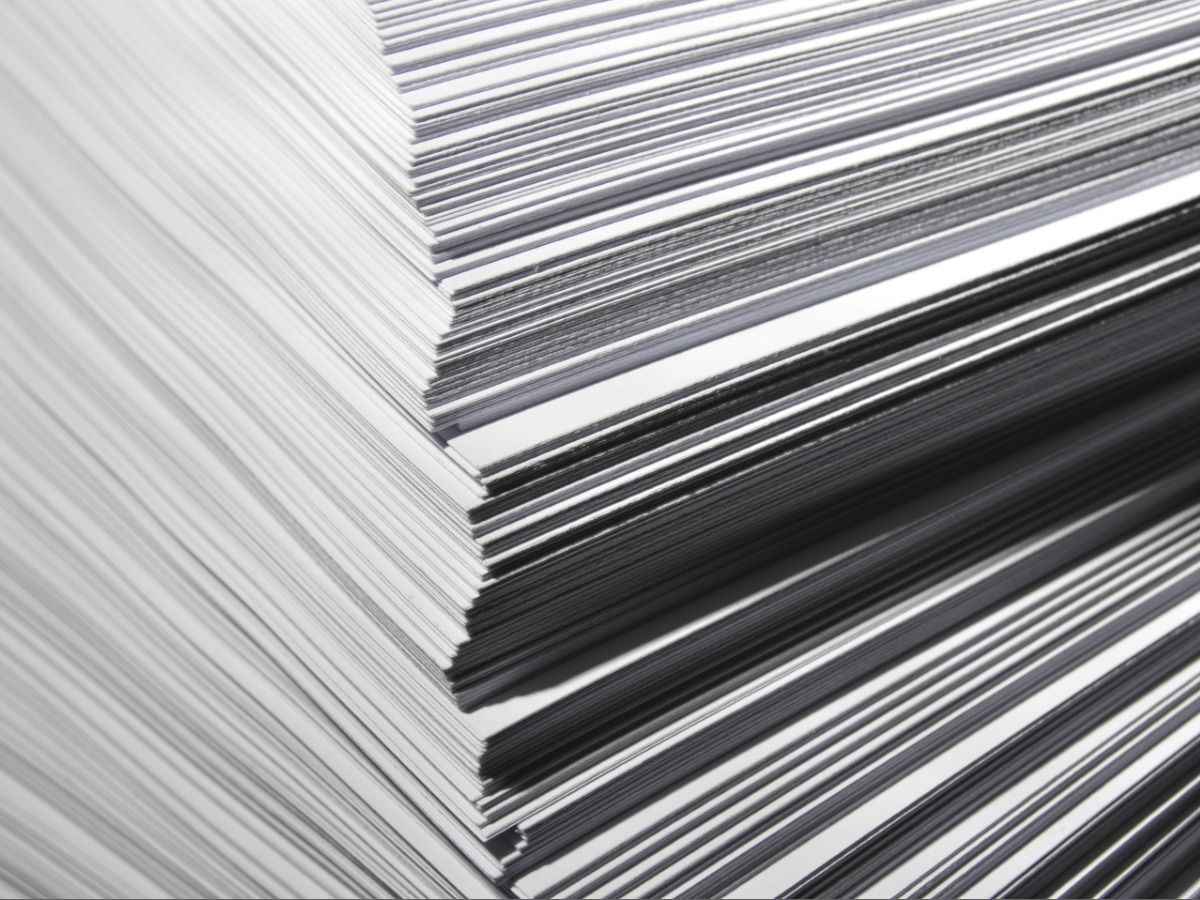 A stack of documents full frame - The ultimate brand audit guide in 2021 - Image