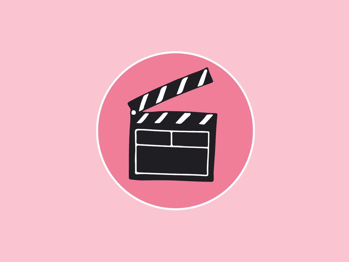 Image with a clapperboard on a pink background - Essential video marketing tips for beginners in 2021 - Image