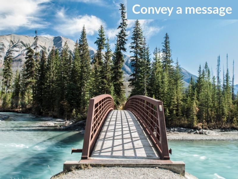 An image of a bridge over a river in a forest with the caption 'convey a message' - Learn about the power of visual storytelling in marketing - Image